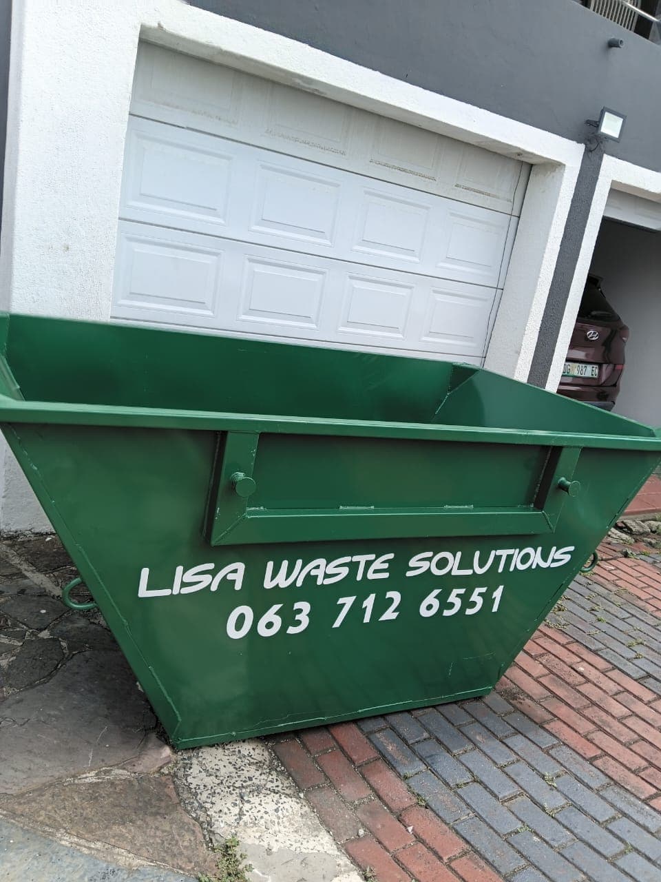 Skip bin dropped off at a residential driveway